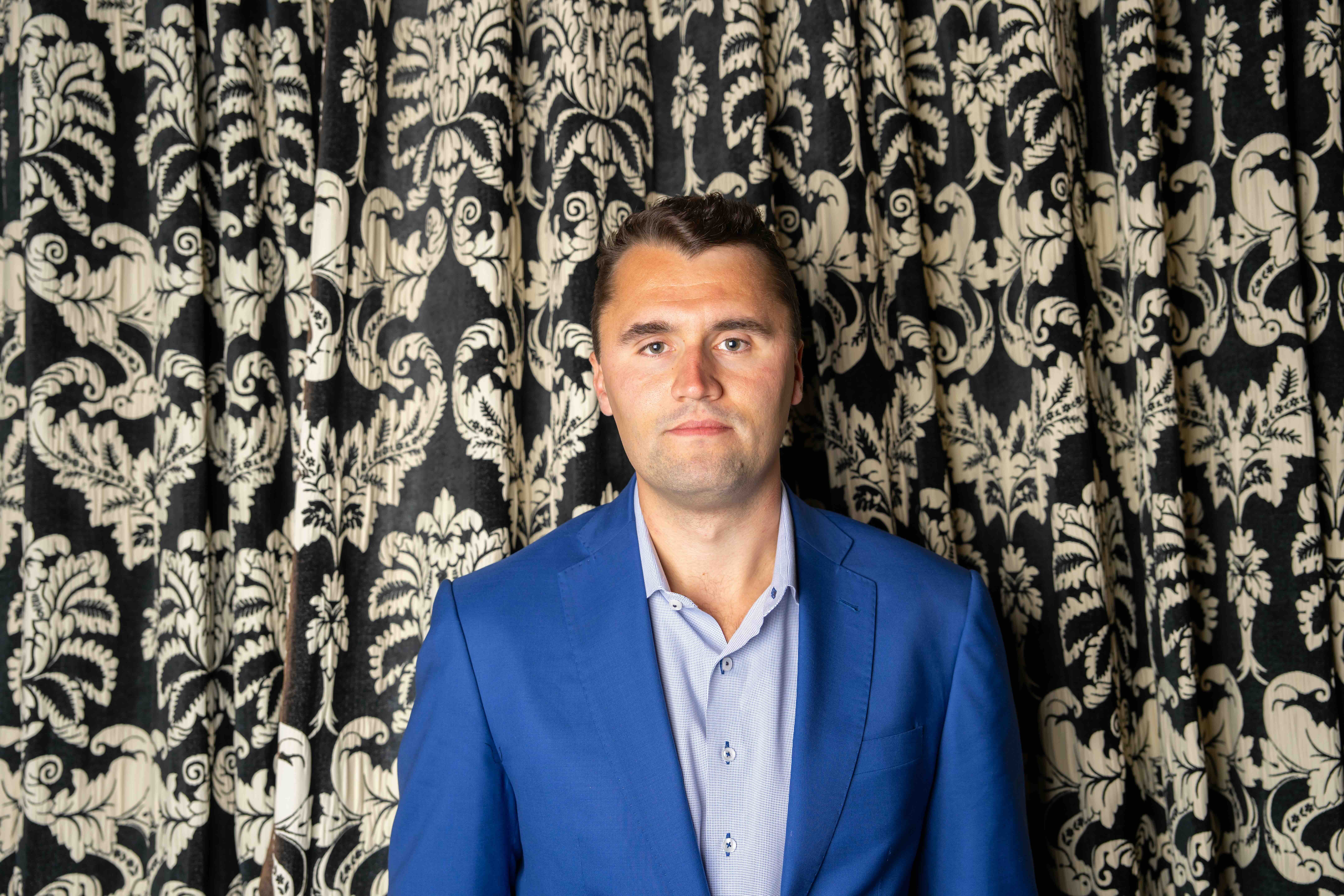 CAMBRIDGE, CAMBRIDGESHIRE - MAY 19: Charlie Kirk poses at The Cambridge Union on May 19, 2025 in Cambridge, Cambridgeshire...