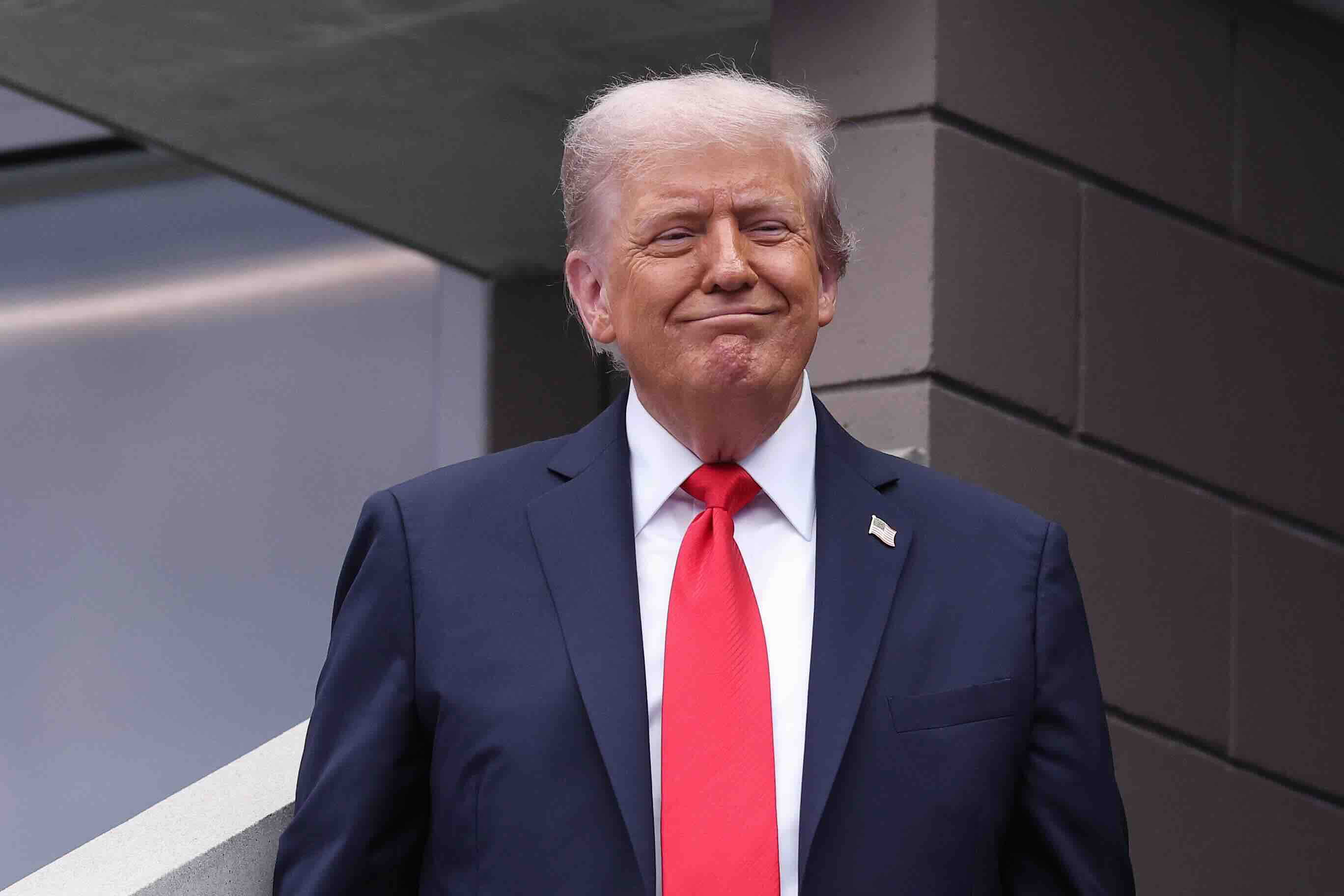 NEW YORK, NEW YORK - SEPTEMBER 07: U.S. President Donald Trump reacts as he arrives prior to the Men's Singles Final match...