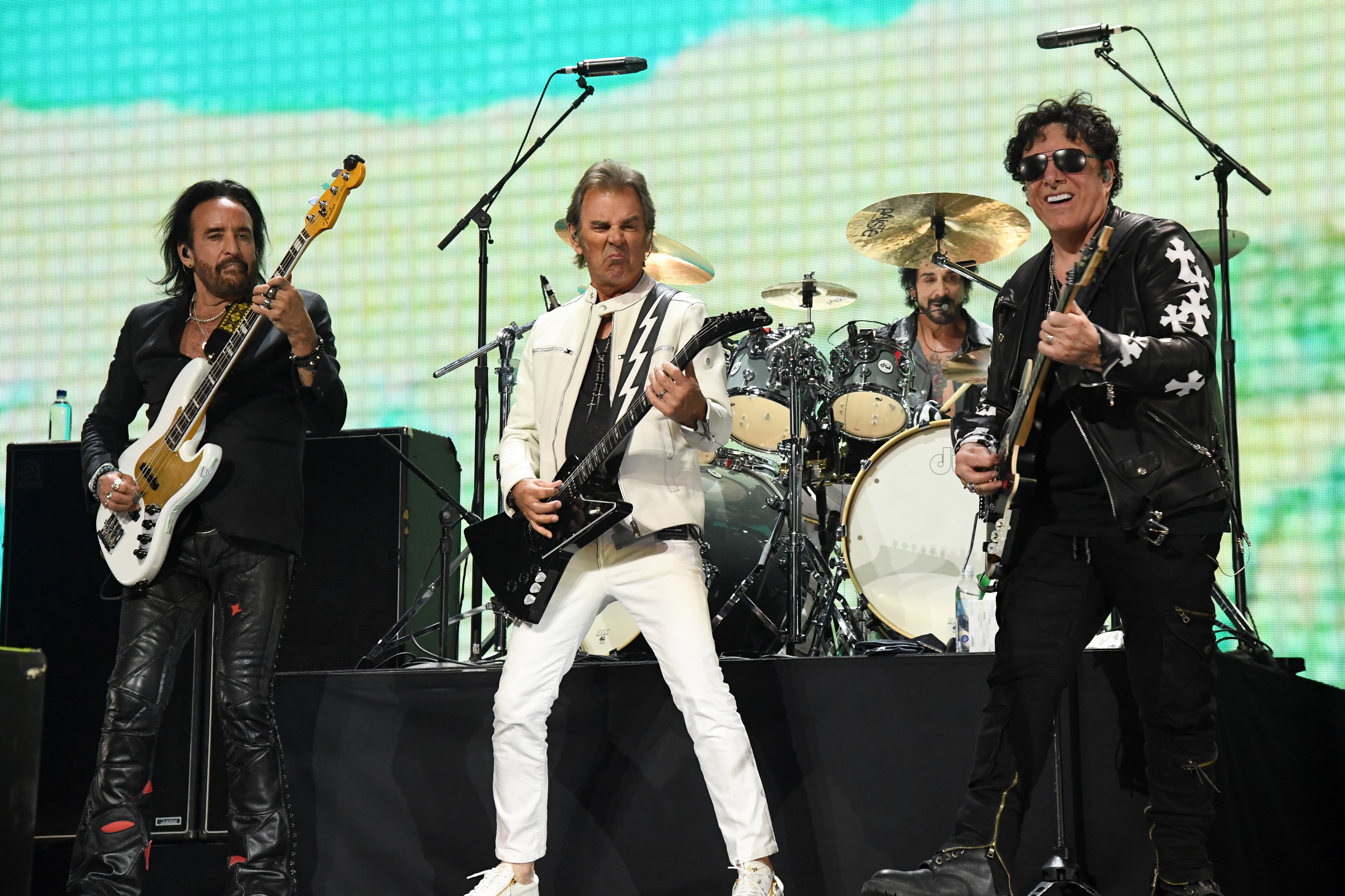 LAS VEGAS, NEVADA - SEPTEMBER 18: (L-R) Marco Mendoza, Jonathan Cain, Deen Castronovo, and Neal Schon of Journey perform o...