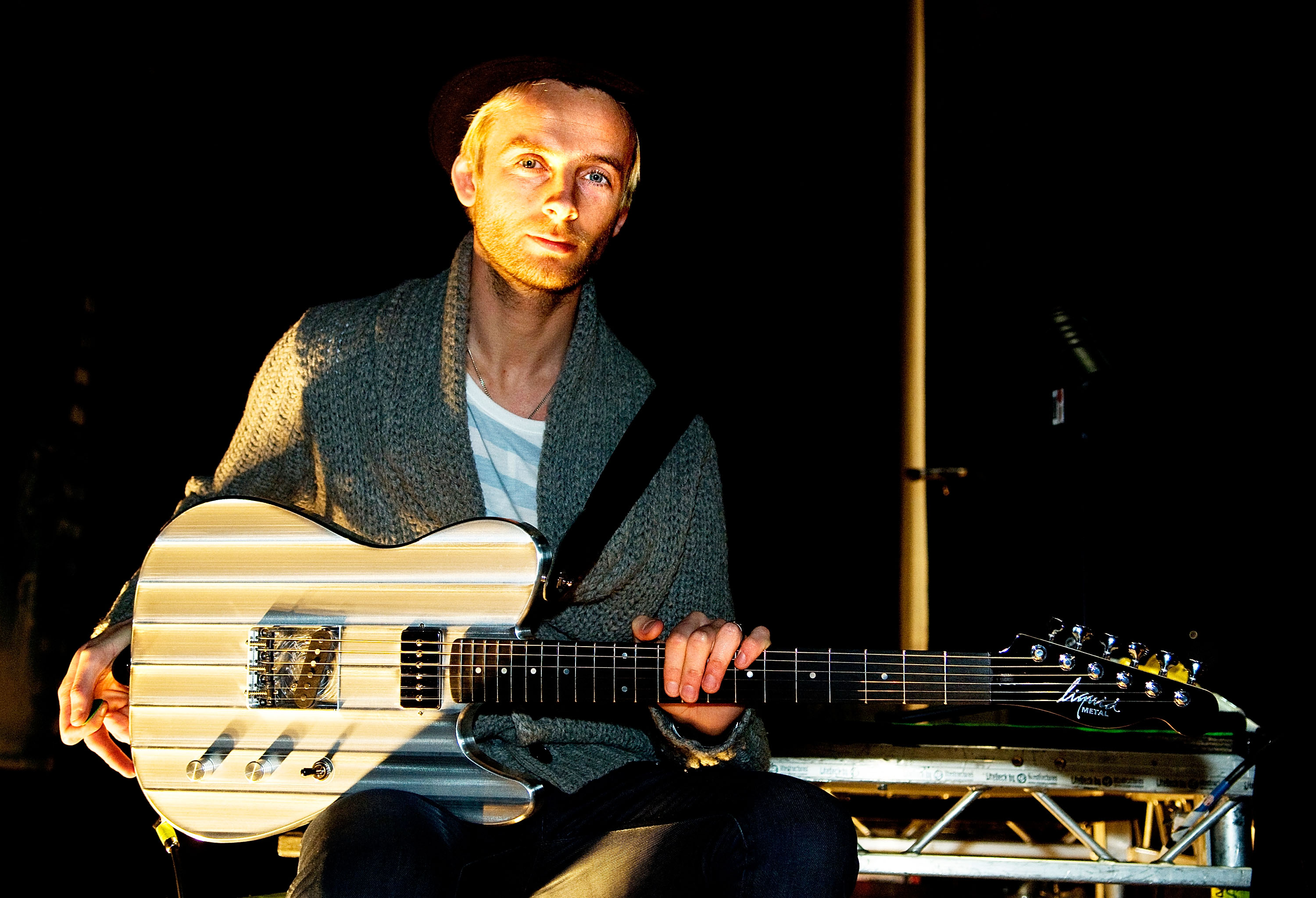 MANCHESTER, ENGLAND - FEBRUARY 25:  ** EXCLUSIVE COVERAGE ** Lee Gaze of Lostprophets poses with his Liquid Metal Guitar, ...
