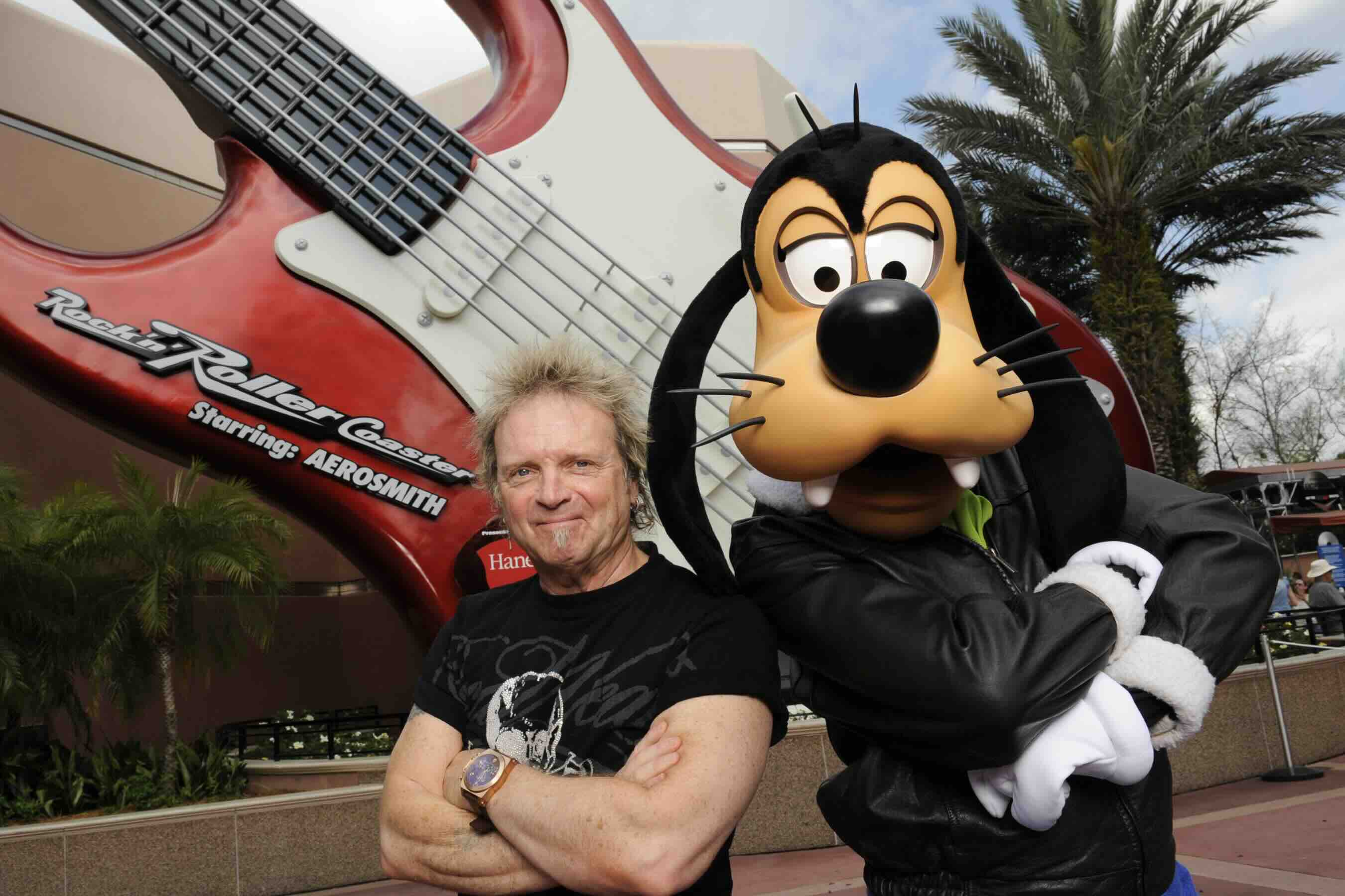 (FEB. 25, 2011):  Aerosmith drummer Joey Kramer poses with Disney character Goofy Feb. 25, 2011 at Disney's Hollywood Stud...