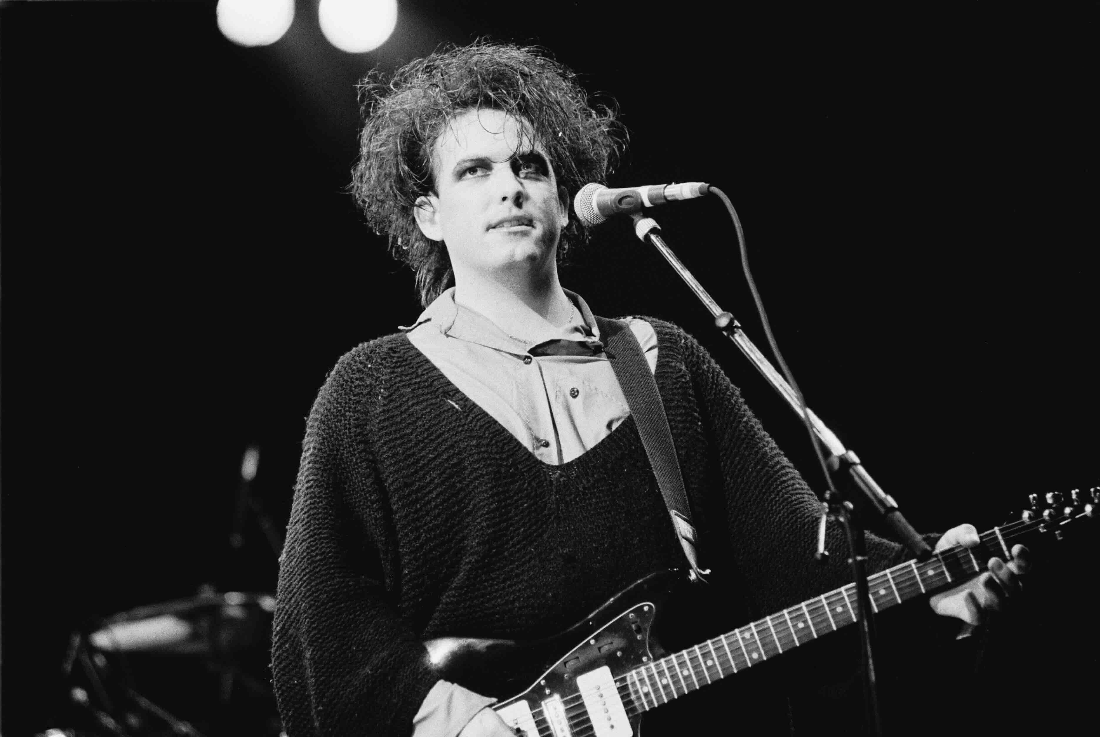 Robert Smith, vocal, performs with The Cure at Torhout/Werchter festival in Torhout, Belgium on 7th July 1989. (Photo by F...