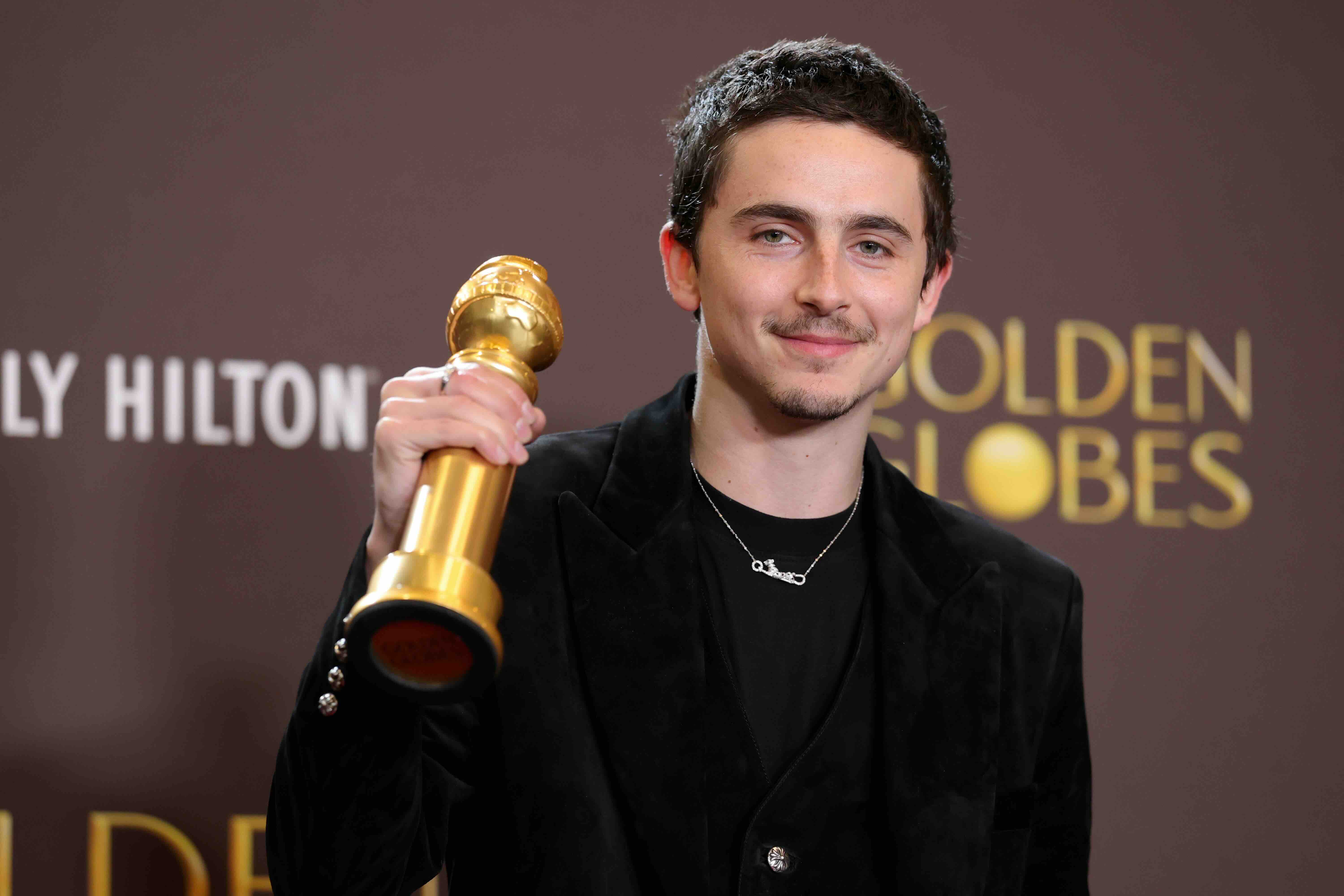 BEVERLY HILLS, CALIFORNIA - JANUARY 11: (FOR EDITORIAL USE ONLY) Timothée Chalamet, winner of the Best Performance by a M...