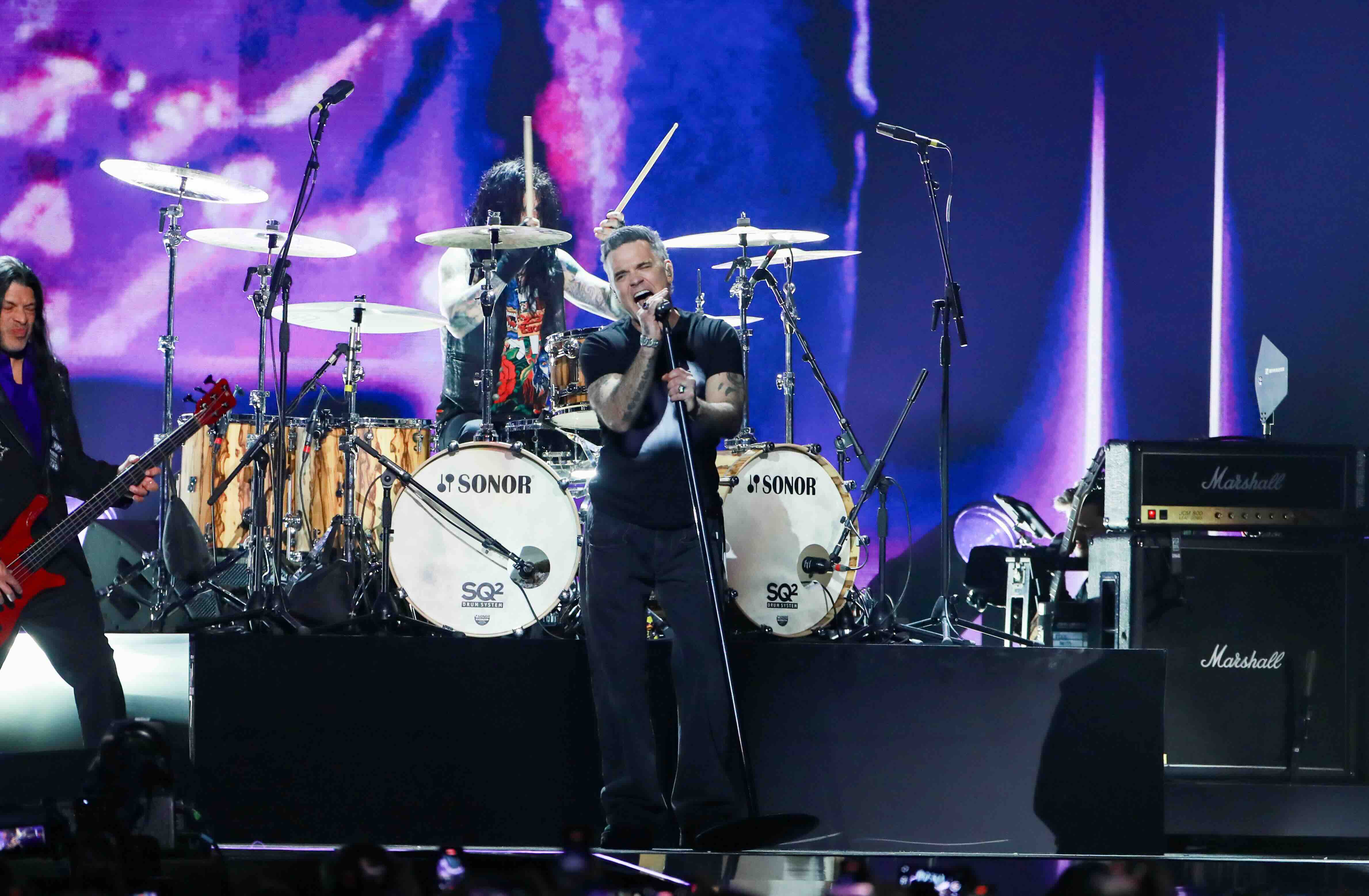 MANCHESTER, ENGLAND - FEBRUARY 28: (EDITORIAL USE ONLY) Robbie Williams performs at The BRIT Awards 2026 at Co-op Live on ...