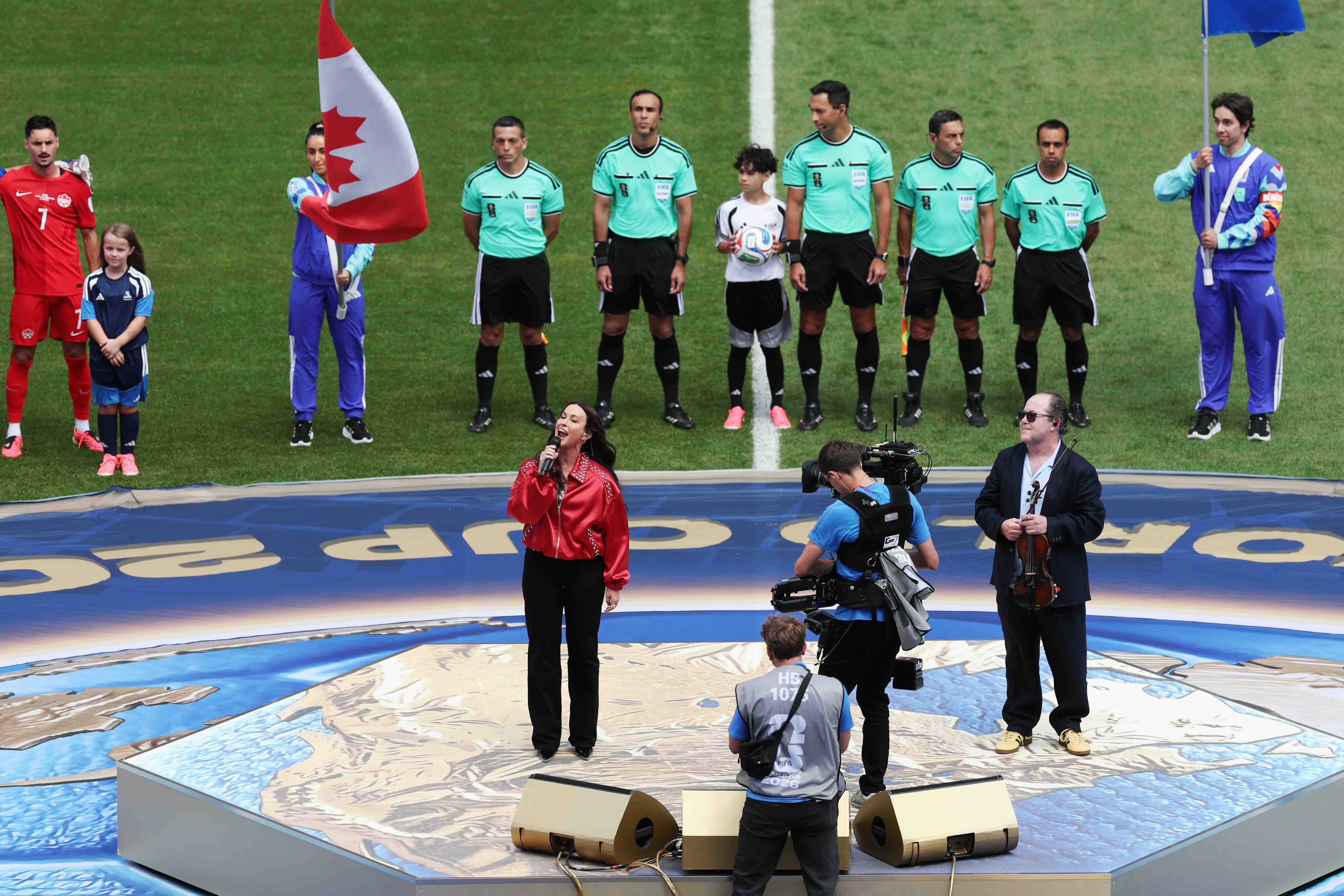 TORONTO, ONTARIO - JUNE 12: Alanis Morissette performs the Canadian national anthem before the FIFA World Cup 2026 Group B...
